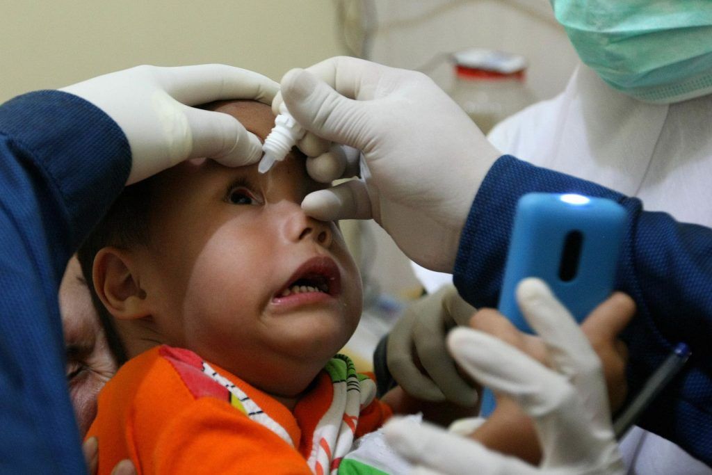 Alif, not a fan of eye drop. Tropicamet drop was put on his eye, to allow his pupil to dilate so our doctor can have a better view on the condition of his cataract.